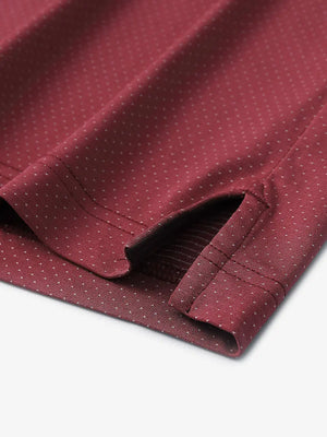 Detail of side slit hem on WINE 4 Way Stretch Jacquard Polo — clean stitching and stretch finish