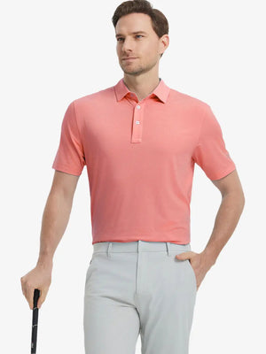 Model in PEACH PINK Jacquard Polo posing with golf club — active and athletic on the front view