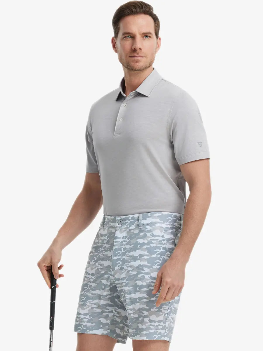 Model in LIGHT GREY Jacquard Polo posing with golf club — active and athletic on the front view