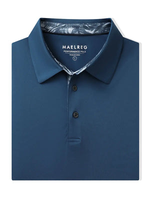 Folded Blue Everyday Classic Solid Polo neatly laid out for display