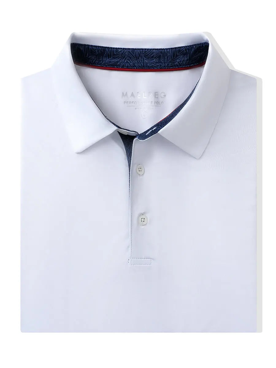 Folded White Everyday Classic Solid Polo neatly laid out for display