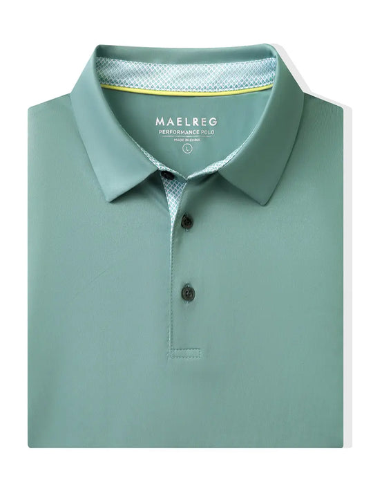 Folded Beryl Green Everyday Classic Solid Polo neatly laid out for display