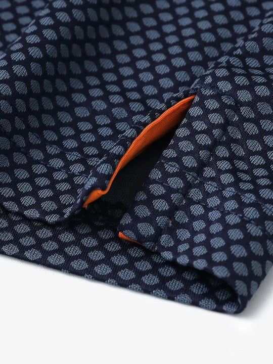 GREY NAVY Your Favorite Jacquard Polo close-up of shirt hem slit detail