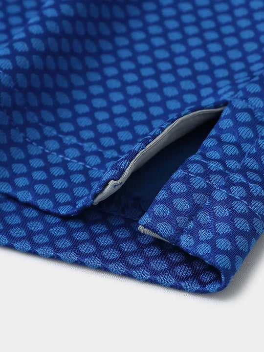 COBALT Your Favorite Jacquard Polo close-up of shirt hem slit detail