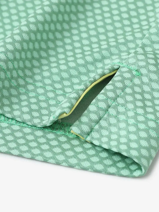 LIGHT GREEN Your Favorite Jacquard Polo close-up of shirt hem slit detail