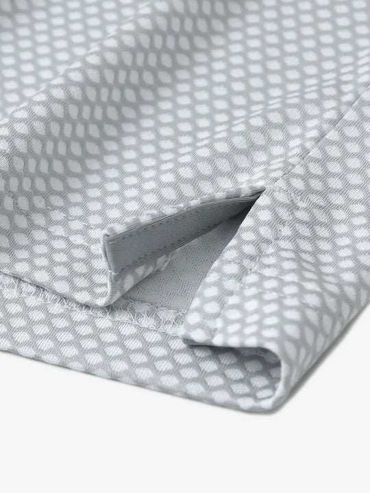 LIGHT GREY Your Favorite Jacquard Polo close-up of shirt hem slit detail