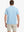 Back half-body view of Modern Texture Stylish Polo in SKY BLUE worn by model.