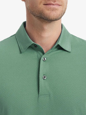 Close-up front shot from nose to chest of model wearing BERYL GREEN 4 Way Stretch Jacquard Polo