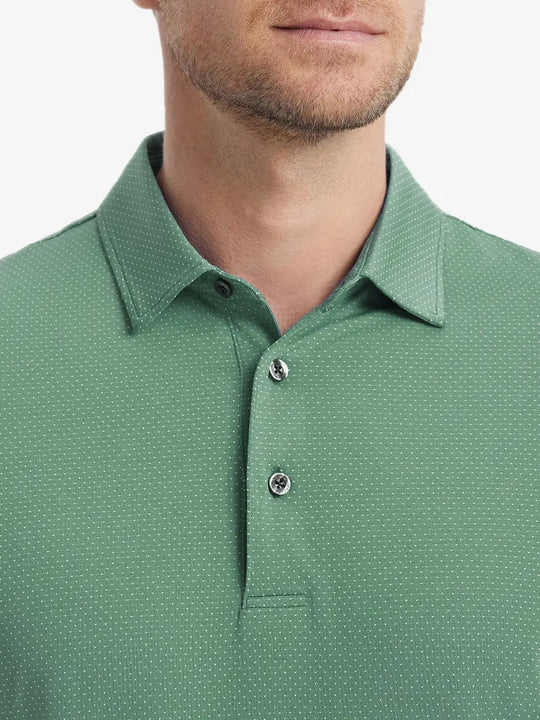 Close-up front shot from nose to chest of model wearing BERYL GREEN 4 Way Stretch Jacquard Polo
