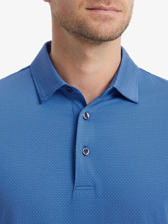 Close-up front shot from nose to chest of model wearing BLUE 4 Way Stretch Jacquard Polo