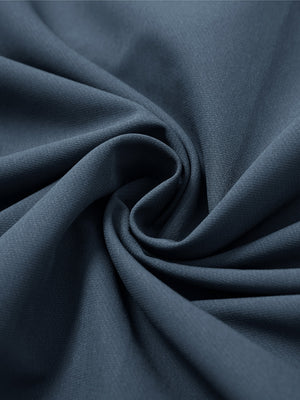 Mock neck quarter button golf pullover, detailed fabric close-up in misty blue showing soft texture and fine knit finish