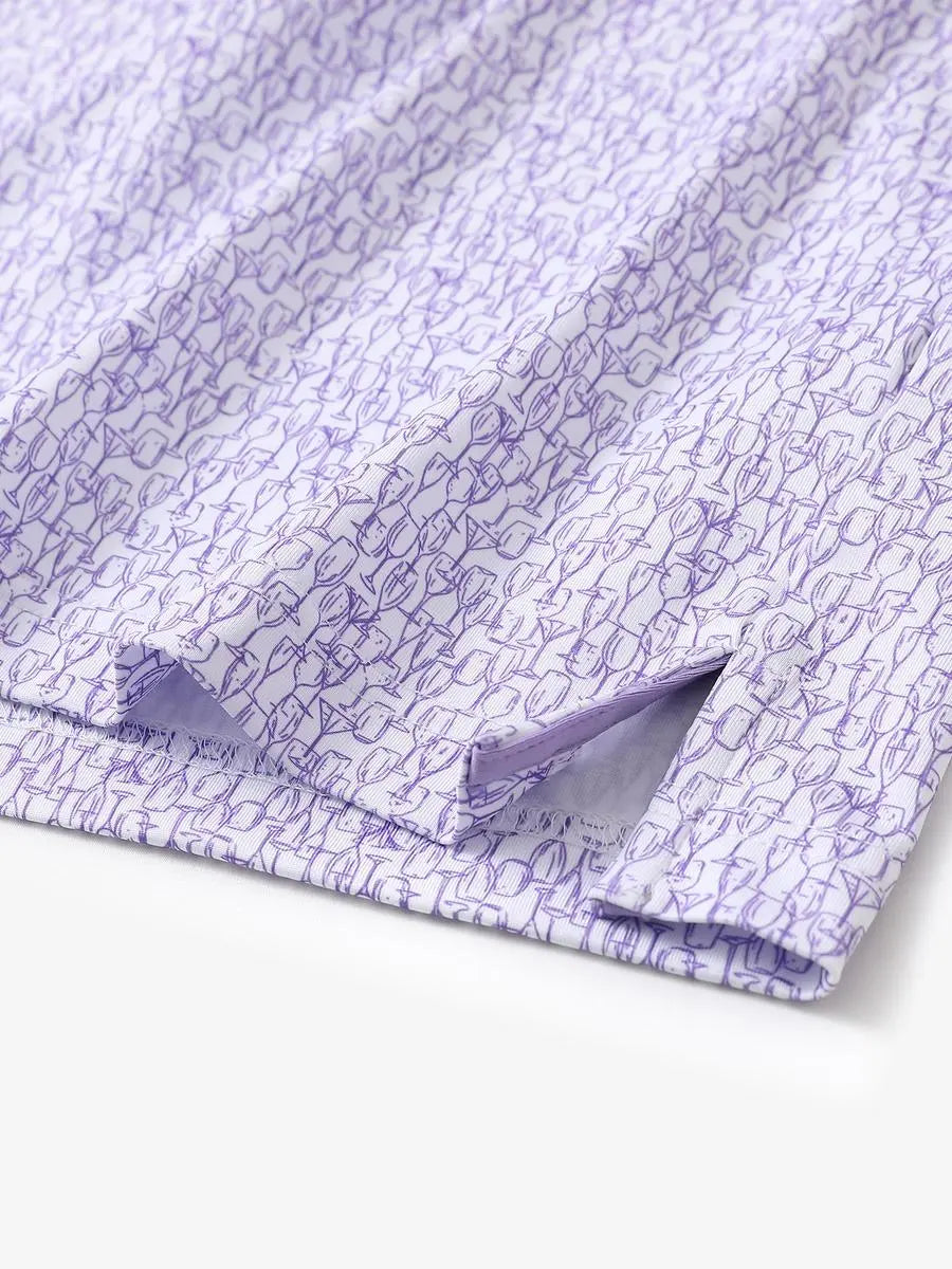 Hem slit detail of MAELREG Performance Jersey Print Polo in Purple Wine Glass – comfort & movement