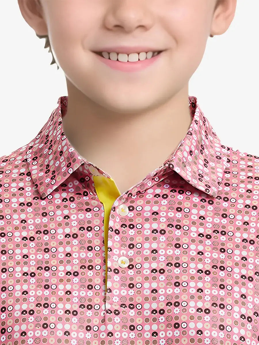 Front chest view of PINK DONUT Performance Print Boys Golf Polo with playful vibe
