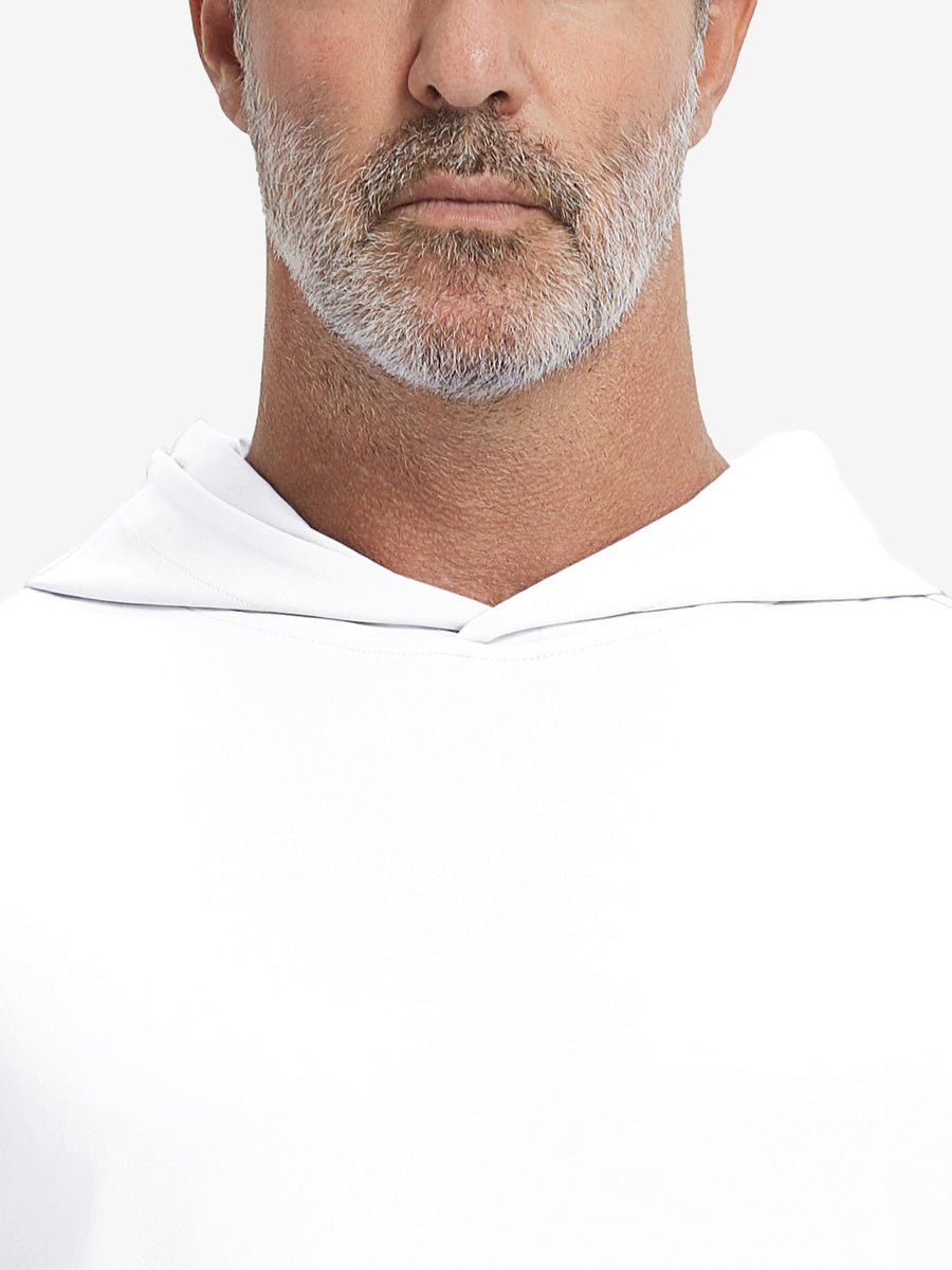 Close-up from nose to chest, showing soft collar texture and stitching detail of the white hoodie.