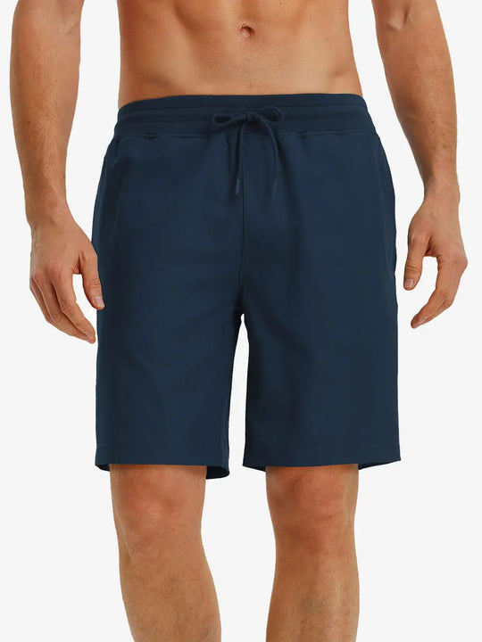 NAVY 9 Inch Performance Active Shorts front view on model