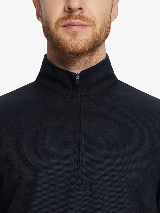 Front half-body view from nose down of model wearing BLACK Premium Jacquard Quarter Zip Pullover.								
