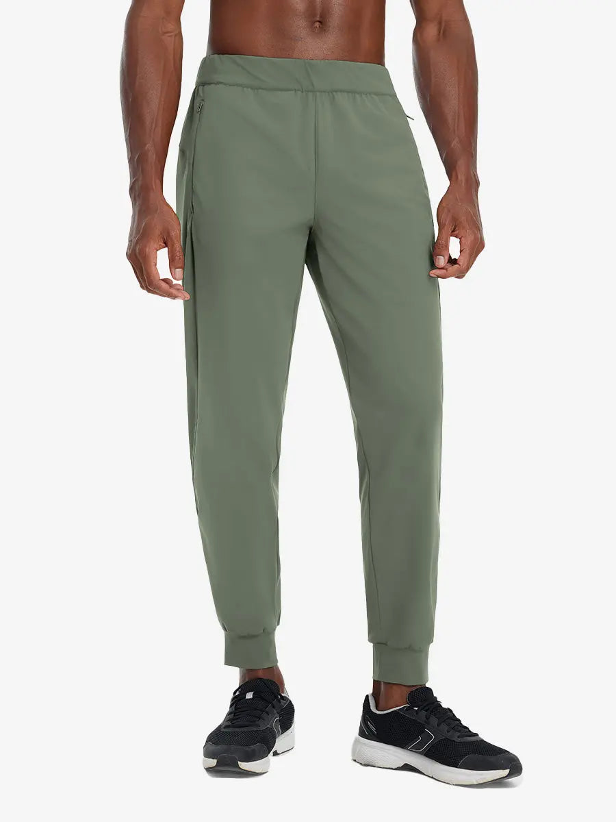 Front lower body view of model wearing OLIVE GREEN Performance Tapered Sports Joggers