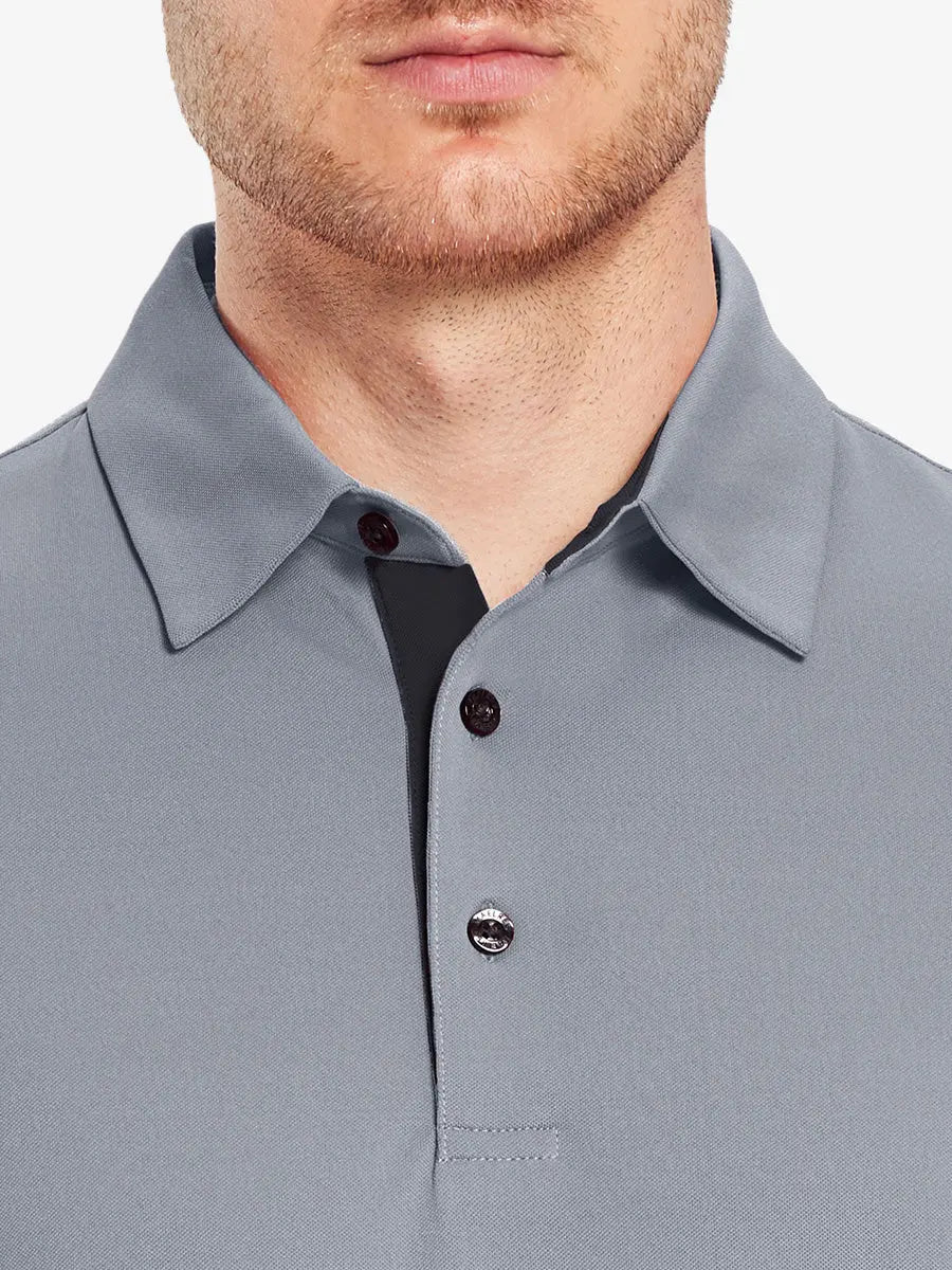 Model wearing the light grey long sleeve pique polo, showcasing its casual and comfortable design.