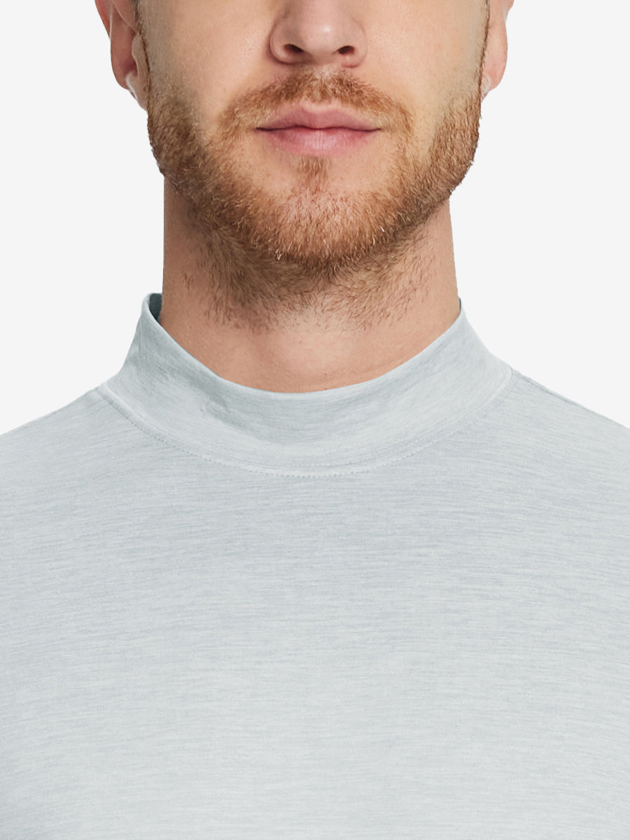Close-up collar view from nose to chest, showing fine fabric texture of the Light Grey Heather turtleneck.
