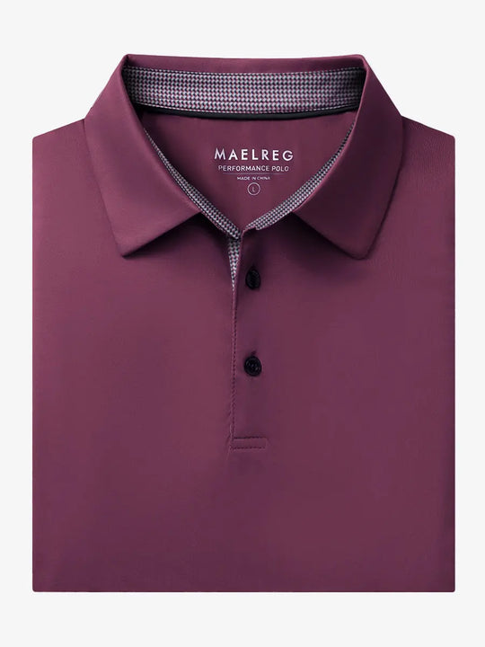 Folded Bordeaux Red Everyday Classic Solid Polo neatly laid out for display