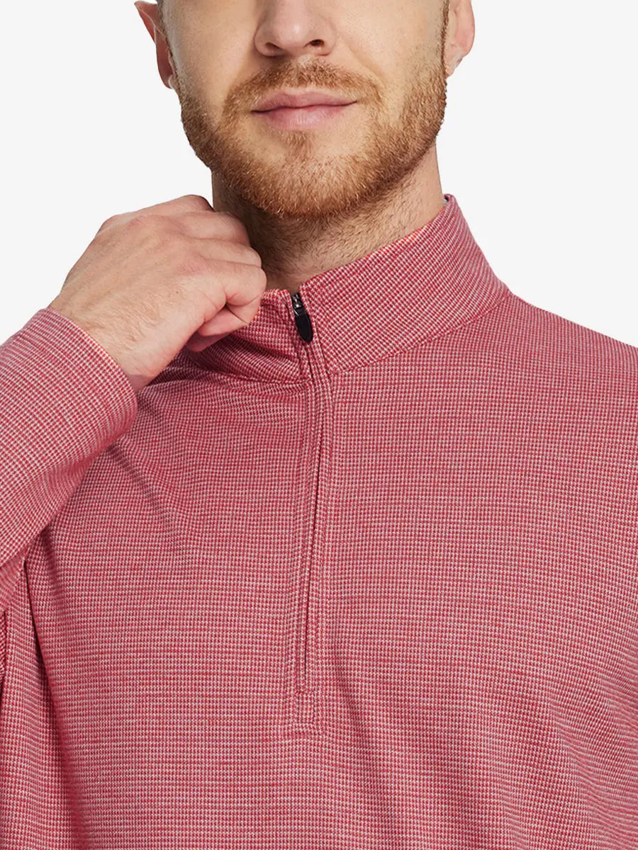 Front half-body view from nose down of model wearing RED HOUNDSTOOTH Premium Jacquard Quarter Zip Pullover.								

