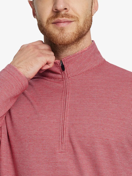 Front half-body view from nose down of model wearing RED HOUNDSTOOTH Premium Jacquard Quarter Zip Pullover.								
