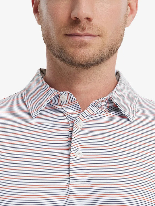 Navy Red Stripe Performance Stripe Golf Shirt – close-up front from model’s nose to chest