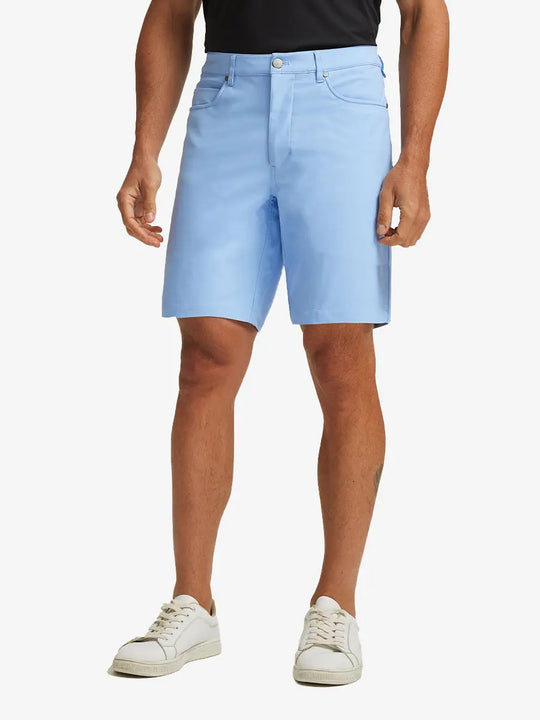 LIGHT BLUE 4-way Stretch Performance Solid Shorts, golfer front lower body with club, 9 Inch view