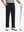 BLACK Water-Resistant Fleece Lined Pants, male model front lower body holding golf club in right hand