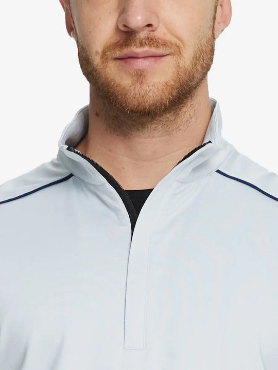 Front half-body view from nose down of model wearing GREY MIST Stretch Solid Fleece Quarter-Zip Vest.								
