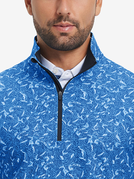 Close-up from nose to chest, showing zipper collar detail and fabric pattern of the line animal pullover.