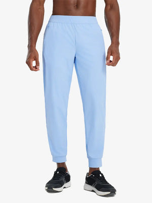 Front lower body view of model wearing LIGHT BLUE Performance Tapered Sports Joggers