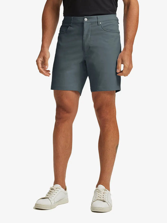 DARK GREY 4-way Stretch Performance Solid Shorts, golfer front lower body with club, 7 Inch view