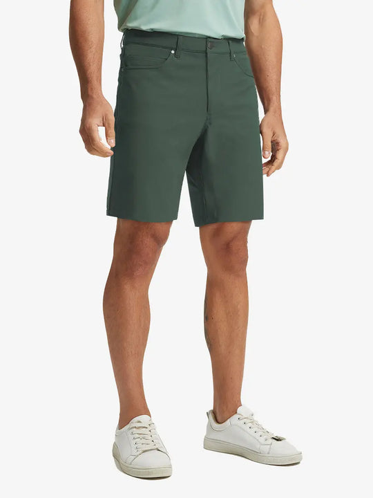 OLIVE GREEN 4-way Stretch Performance Solid Shorts, golfer front lower body with club, 9 Inch view