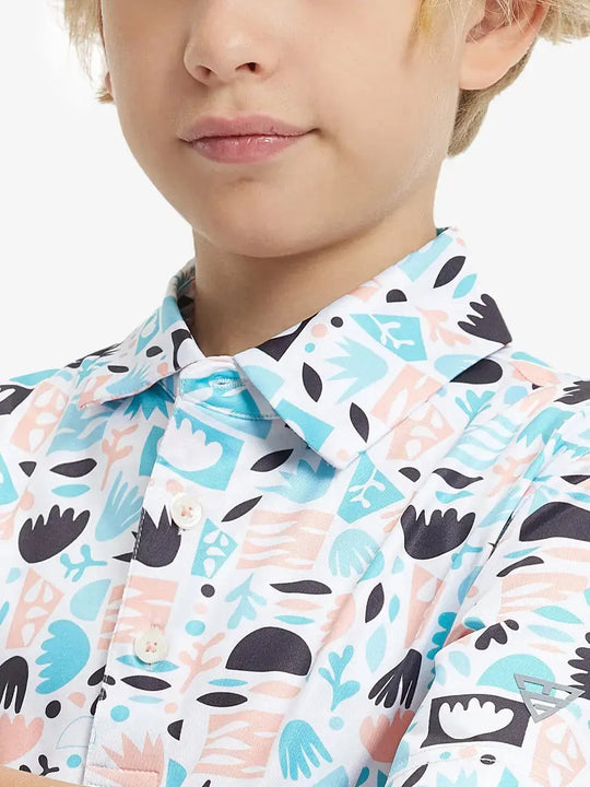 Close-up front view from nose to chest of boy wearing IRREGULAR GEO Performance Print Boys Golf Polo