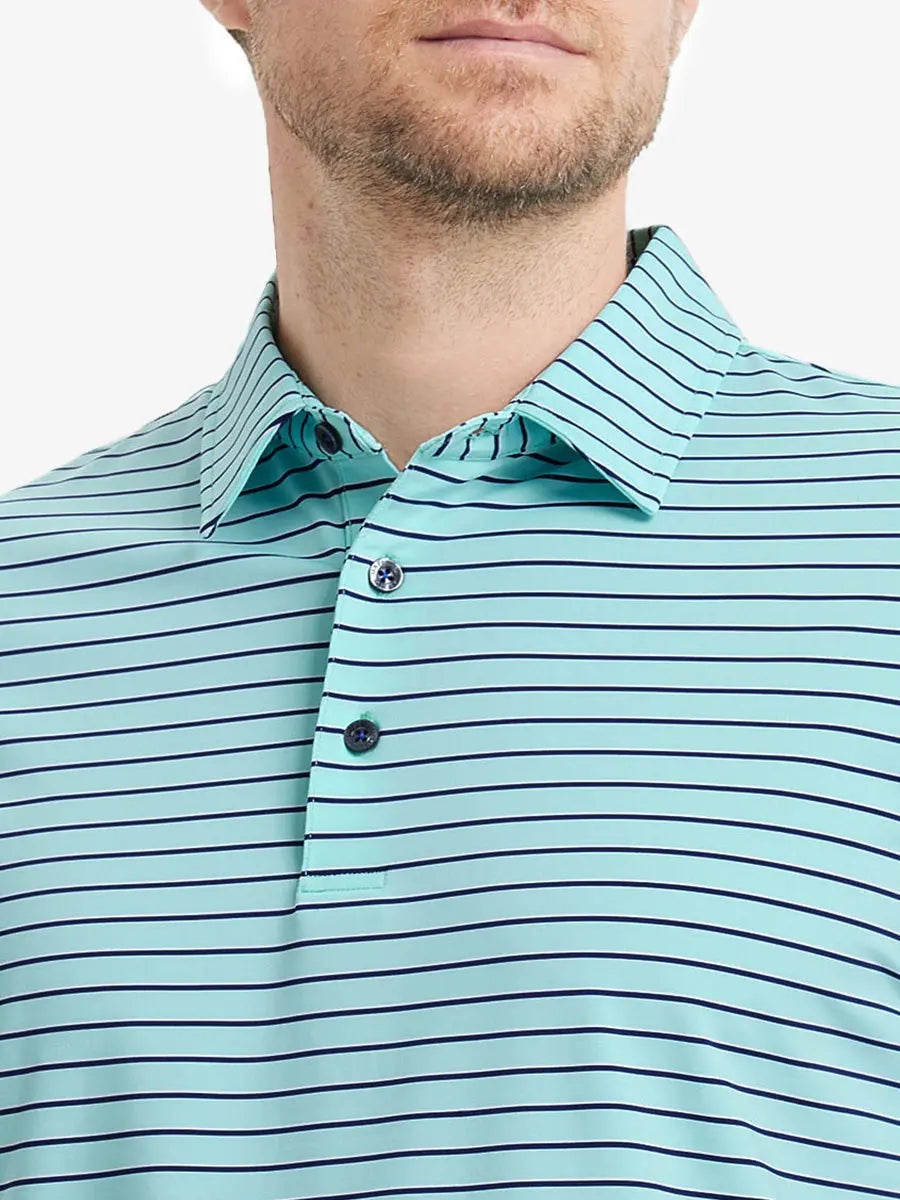 Front chest close-up of TURQUOISE/NAVY STRIPE Polo showing vibrant yarn-dyed stripes