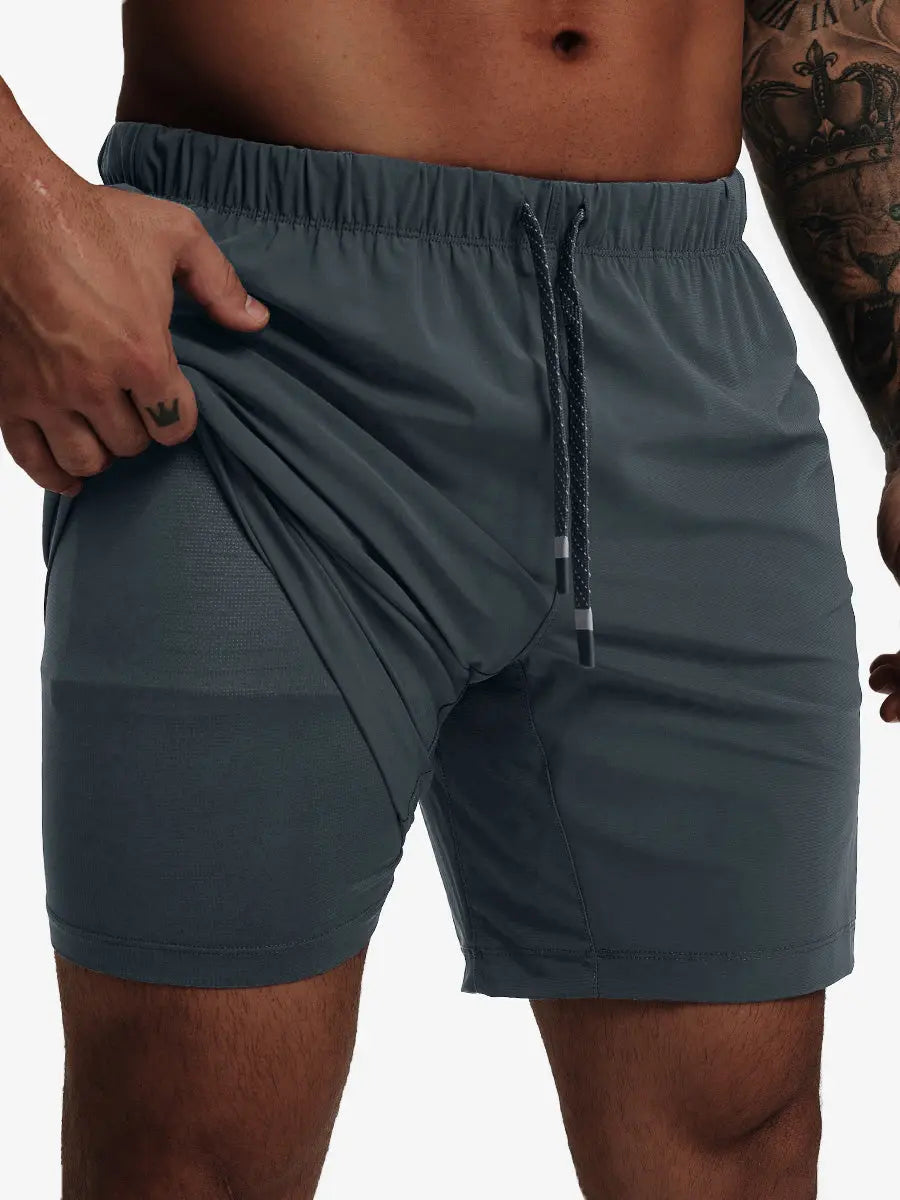 Front lower-body view from waist to knees showing stretch of DARK GREY 2 in 1 Running Sports Shorts with Liner