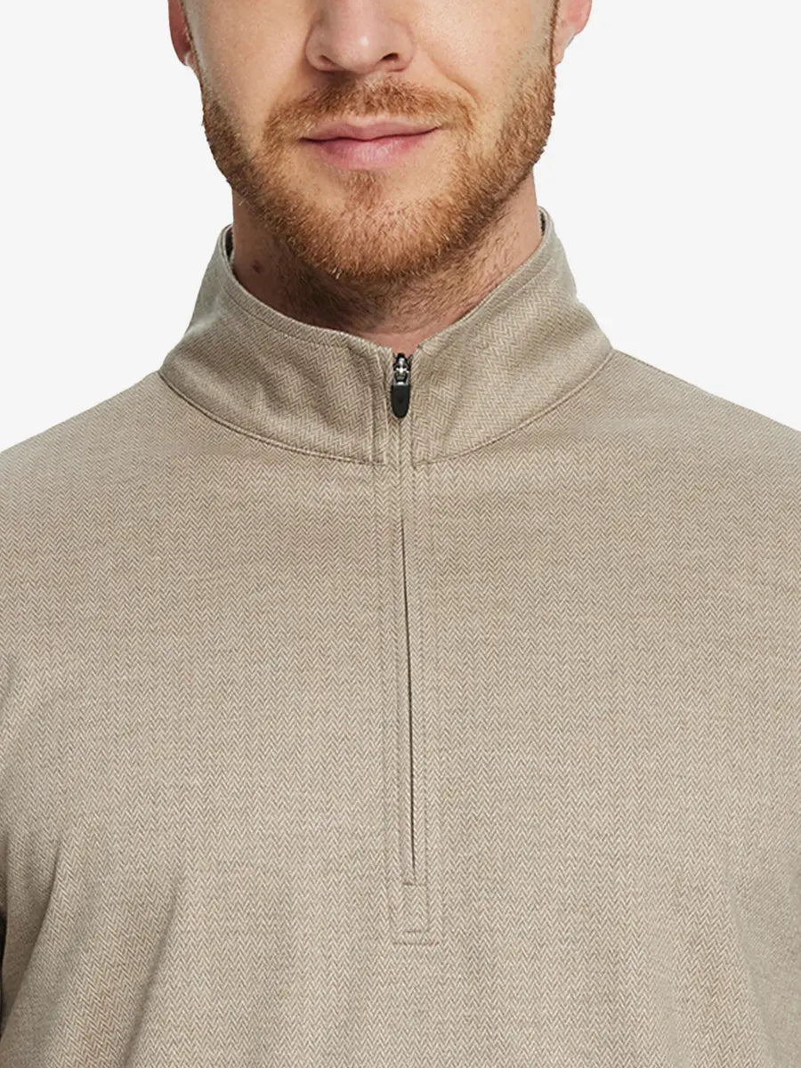 Front half-body view from nose down of model wearing DARK KHAKI HERRINGBONE Premium Jacquard Quarter Zip Pullover.								

