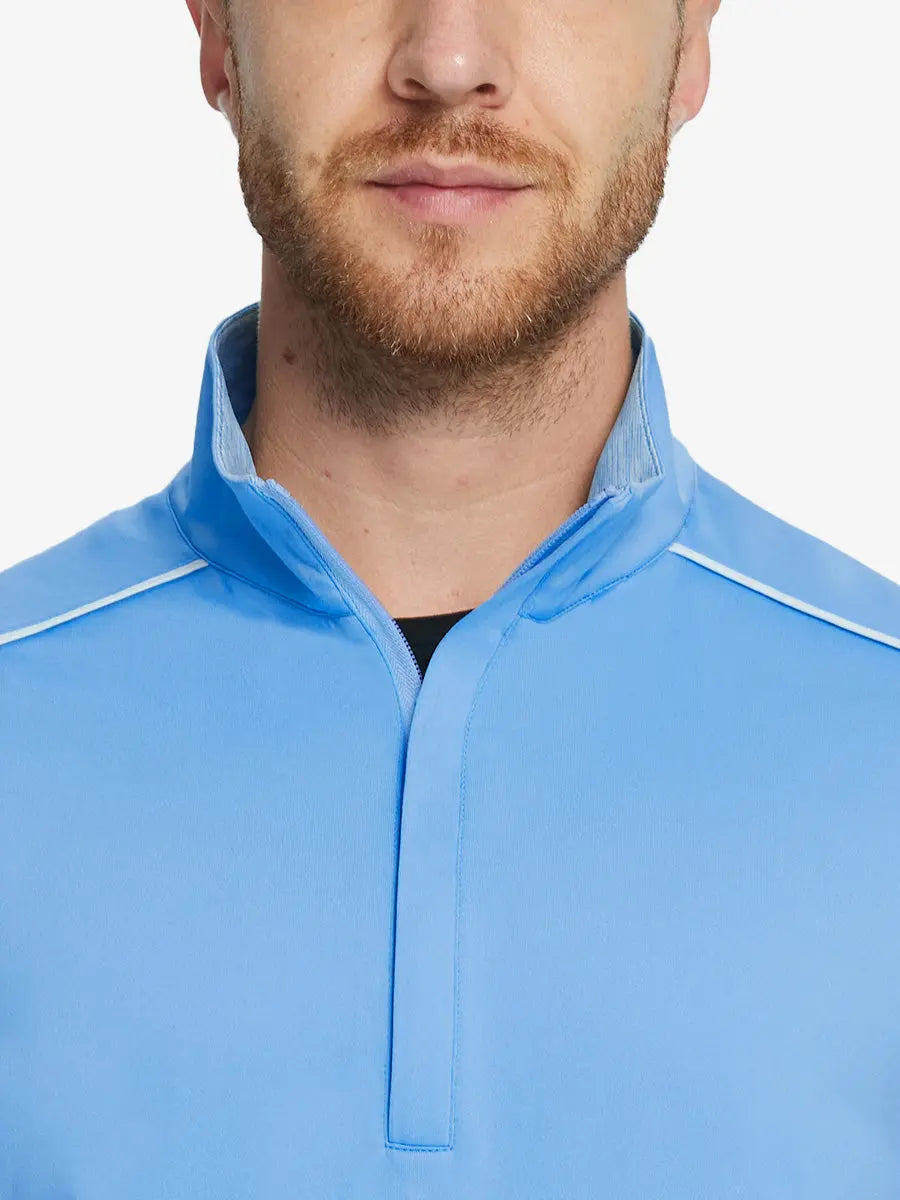 Front half-body view from nose down of model wearing SKY BLUE Stretch Solid Fleece Quarter-Zip Vest.								
