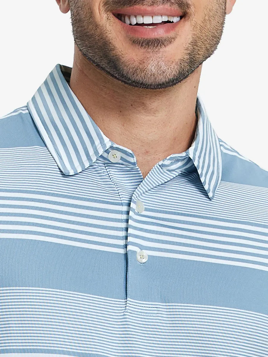 Front half-body view from nose to chest of model wearing BLUE WHITE STRIPE Performance Yarn Dye Striped Polo
