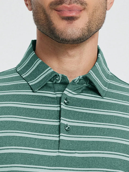 Front half-body view from nose to chest of model wearing DARK GREEN STRIPE Performance Yarn Dye Striped Polo