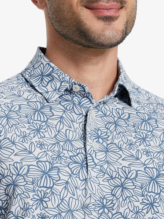 Front half-body view from nose to chest of model wearing STERLING GREY FLOWER Popular Heather Print Polo