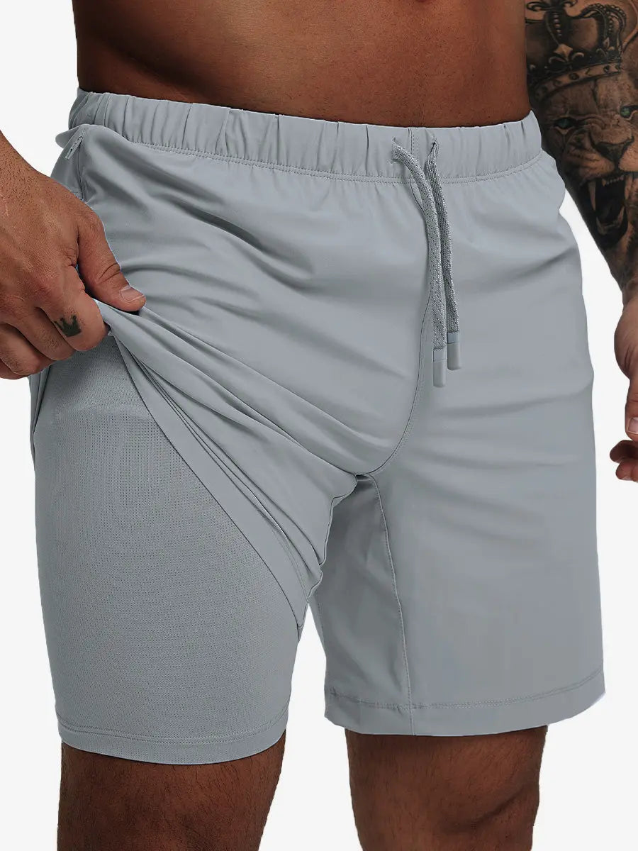 Front lower-body view from waist to knees showing stretch of LIGHT GREY 2 in 1 Running Sports Shorts with Liner