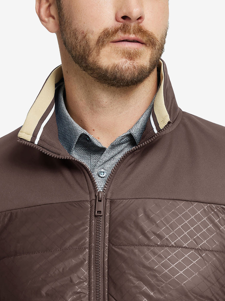 Close-up from nose to chest, showing collar detail and fleece texture of the Dark Brown winter jacket.