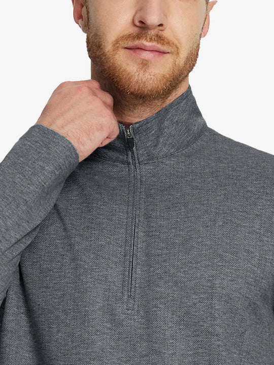 Front half-body view from nose down of model wearing DARK GRAY HERRINGBONE Premium Jacquard Quarter Zip Pullover.								
