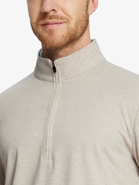 Front half-body view from nose down of model wearing KHAKI HOUNDSTOOTH Premium Jacquard Quarter Zip Pullover.								
