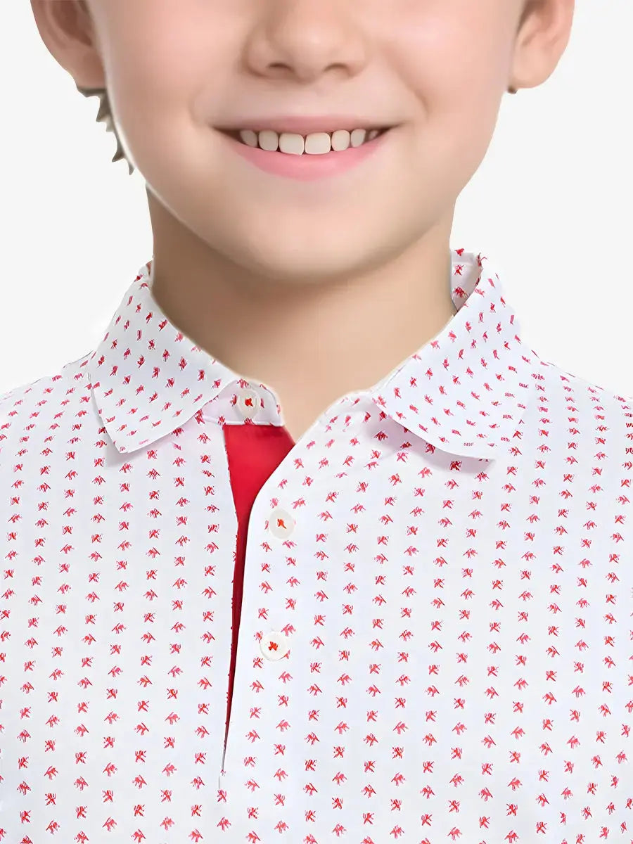 Close-up front view from nose to chest of boy wearing WHITE RED LION Performance Print Boys Golf Polo