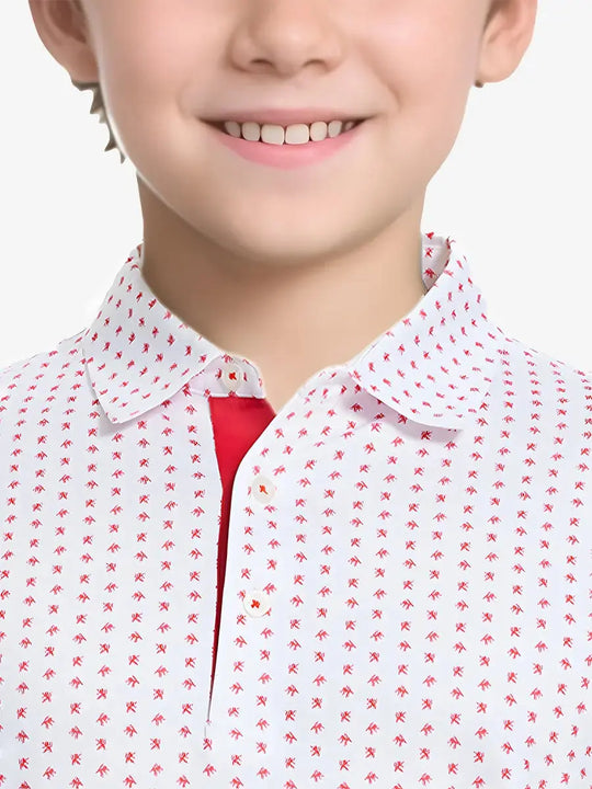 Close-up front view from nose to chest of boy wearing WHITE RED LION Performance Print Boys Golf Polo