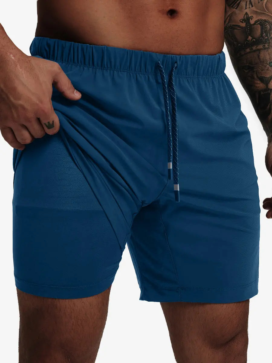 Front lower-body view from waist to knees showing stretch of BLUE INDIGO 2 in 1 Running Sports Shorts with Liner