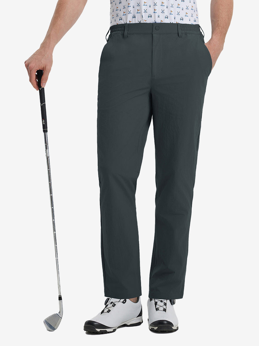 Front lower leg view of Performance Water Resistant Pants in DARK GREY，model holds golf club in right hand.